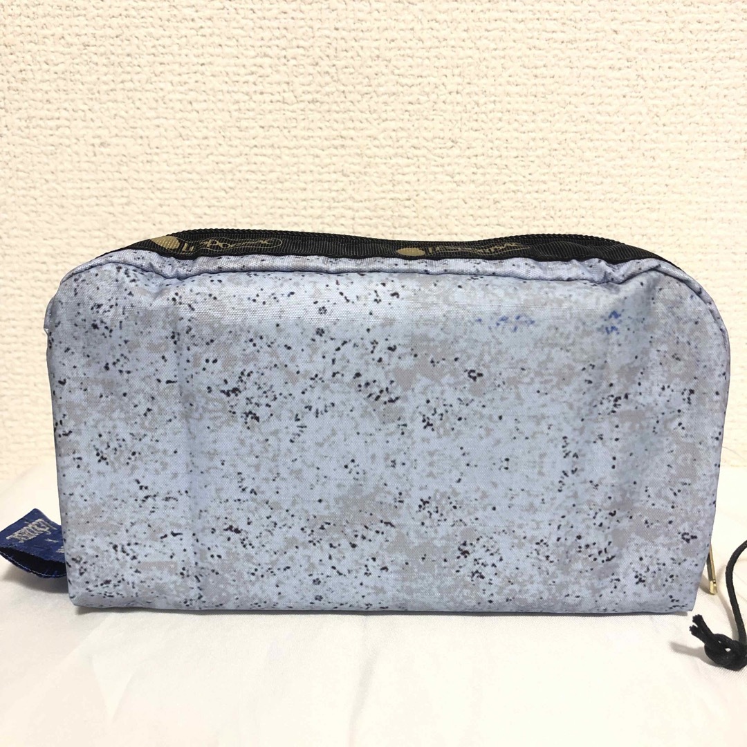 LeSportsac(レスポートサック)の新品 未使用 海外限定 レスポートサック newnewコラボポーチ 寝そべり猫柄 レディースのファッション小物(ポーチ)の商品写真