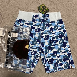 アベイシングエイプ(A BATHING APE)のAPE BAPE KAWS BLUE CAMO スウェットショーツ　ハーフパンツ(ショートパンツ)