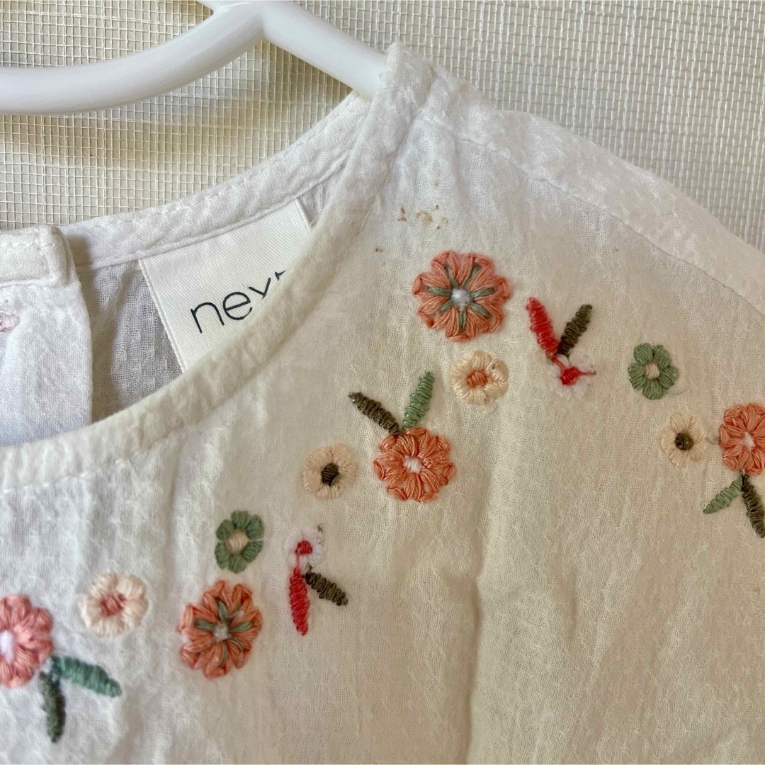 NEXT(ネクスト)のNEXT お花ブラウス 女の子 トップス 1歳 1歳半 子供服 キッズ 半袖 キッズ/ベビー/マタニティのベビー服(~85cm)(シャツ/カットソー)の商品写真