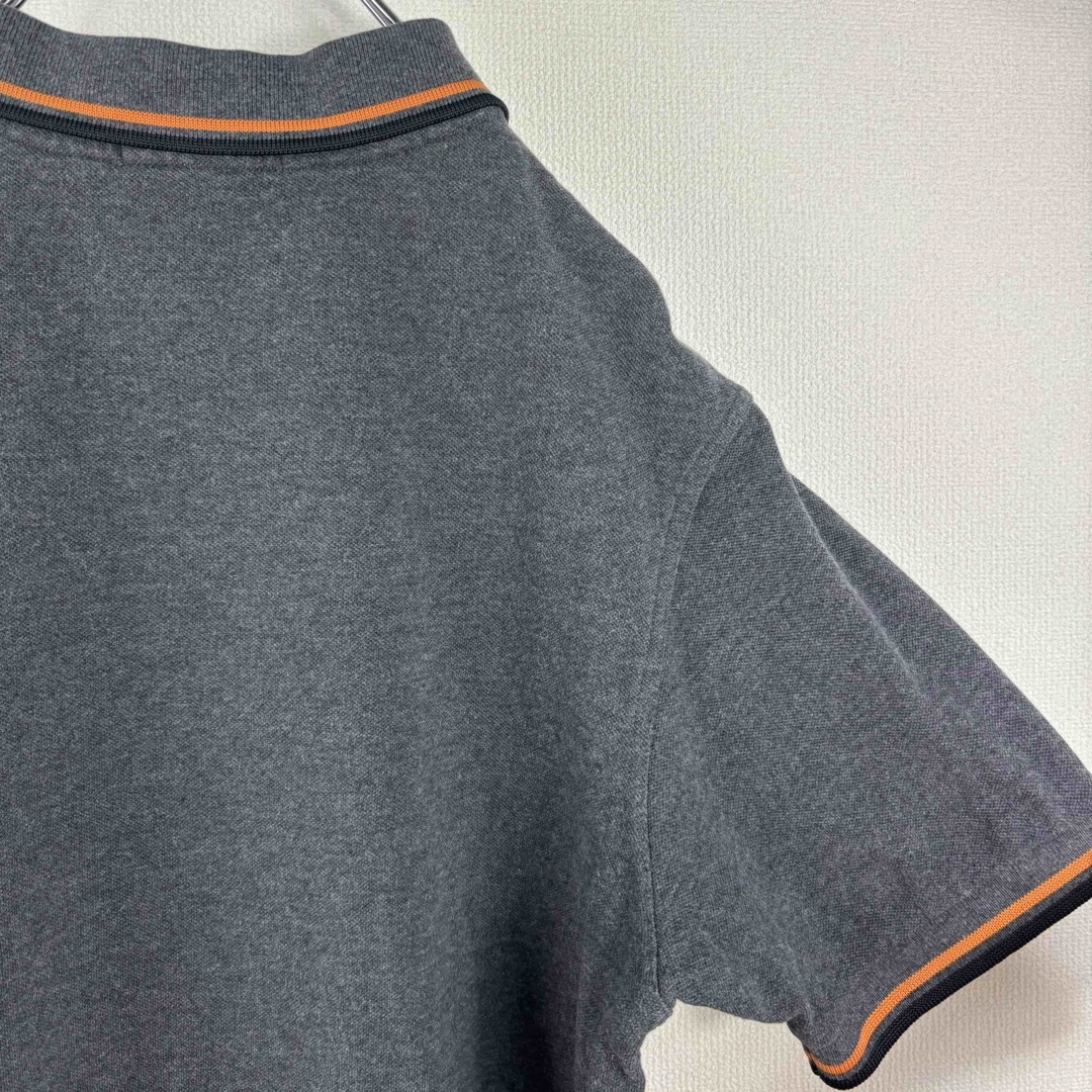 FRED PERRY(フレッドペリー)のフレッドペリー　ポロシャツ　M グレー　オレンジ　ブラック　古着 メンズのトップス(ポロシャツ)の商品写真