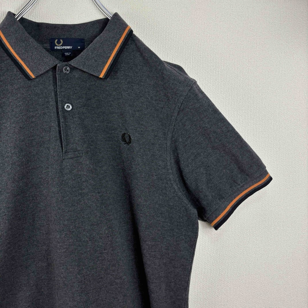 FRED PERRY(フレッドペリー)のフレッドペリー　ポロシャツ　M グレー　オレンジ　ブラック　古着 メンズのトップス(ポロシャツ)の商品写真
