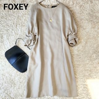 フォクシー(FOXEY)のフォクシー プリーツスリーブドレス ボリュームスリーブワンピース 38(ひざ丈ワンピース)