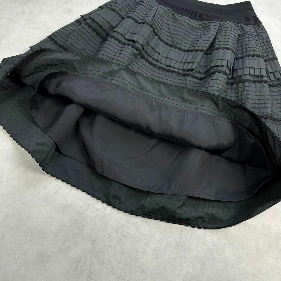 COTOO(コトゥー)のCOTOO コトゥー　タックスカート　黒　36 Sサイズ レディースのスカート(ひざ丈スカート)の商品写真