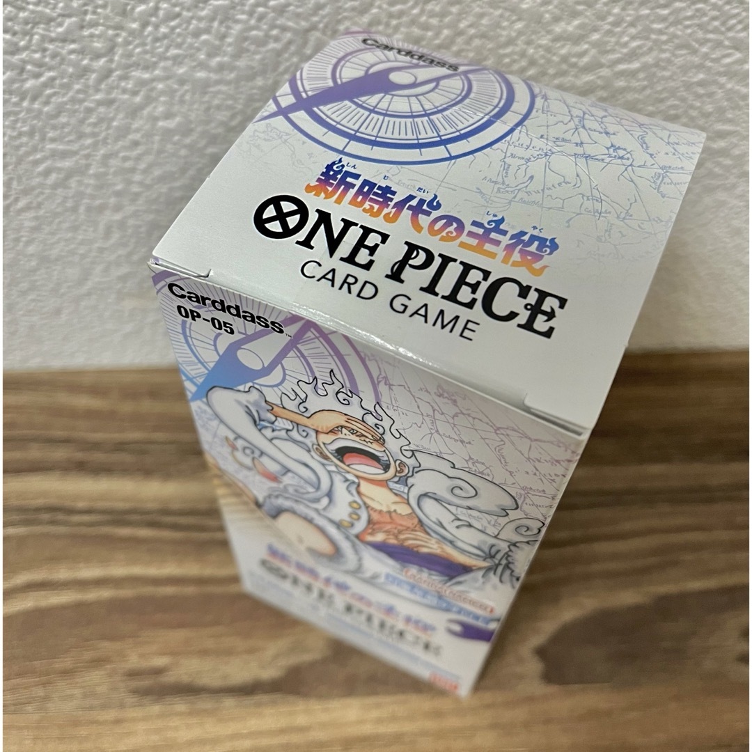 ONE PIECE(ワンピース)のワンピースカード　新時代の主役　テープ付き　1box  未開封　ボックス エンタメ/ホビーのトレーディングカード(Box/デッキ/パック)の商品写真
