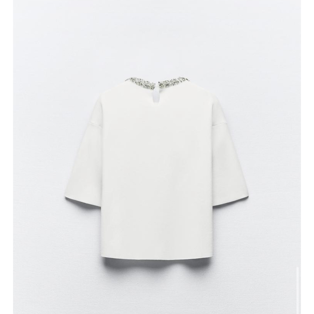 ZARA(ザラ)のZARA ラインストーンネック プレーンニット トップス レディースのトップス(Tシャツ(半袖/袖なし))の商品写真