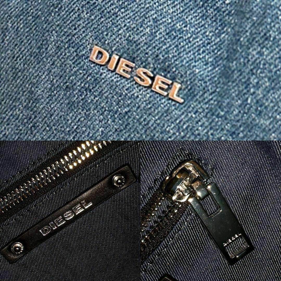 DIESEL(ディーゼル)の【ディーゼル】デニム×レザー ストラップ メタル ロゴ リュック 紺ネイビー×黒 レディースのバッグ(リュック/バックパック)の商品写真