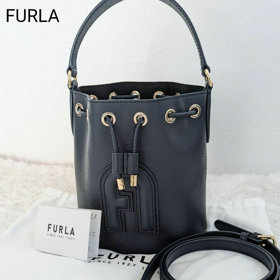 Furla(フルラ)の未使用✨フルラ クリオ 2way ショルダーバッグ 紺 アーチロゴ 現行 巾着 レディースのバッグ(ショルダーバッグ)の商品写真