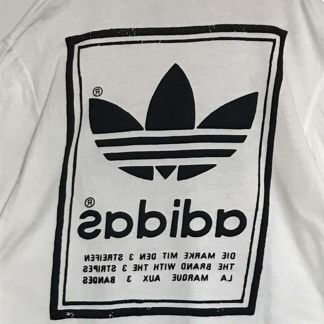 adidas(アディダス)の【両面プリント】アディダス　ロゴ入りTシャツ 人気ホワイト　Ｌサイズ　H891 メンズのトップス(Tシャツ/カットソー(半袖/袖なし))の商品写真