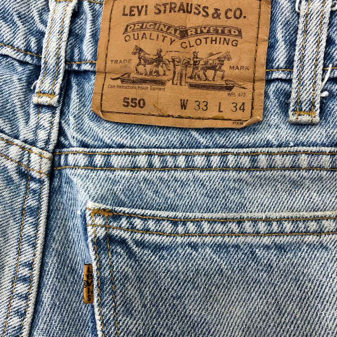 Levi's(リーバイス)の90年代 Levi's リーバイス 550 デニムパンツ オレンジタブ ライトブルー (メンズ W33 L34) 中古 古着 Q7003 メンズのパンツ(デニム/ジーンズ)の商品写真