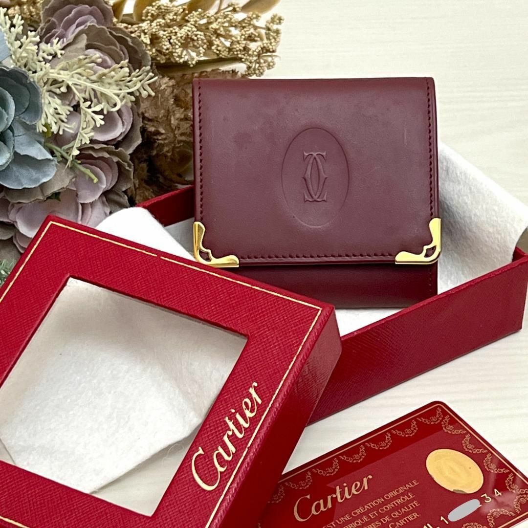 Cartier(カルティエ)のCartier カルティエ マスト ボルドー ゴールド 小銭入れ コインケース レディースのファッション小物(コインケース)の商品写真