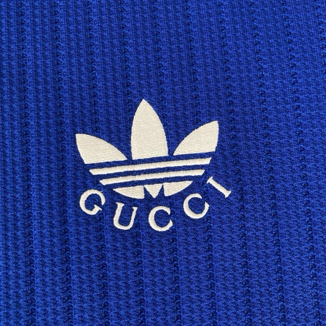 Gucci(グッチ)の新品未使用 タグ付き GUCCI ポロシャツ 青 Lサイズ メンズのトップス(ポロシャツ)の商品写真