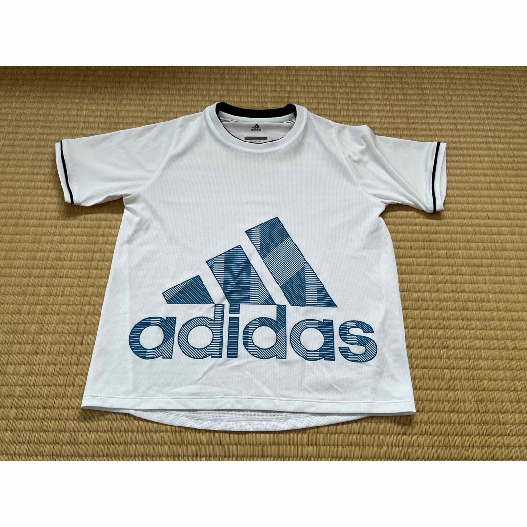 adidas(アディダス)のadidasプラクティスシャツ　150cm スポーツ/アウトドアのサッカー/フットサル(ウェア)の商品写真