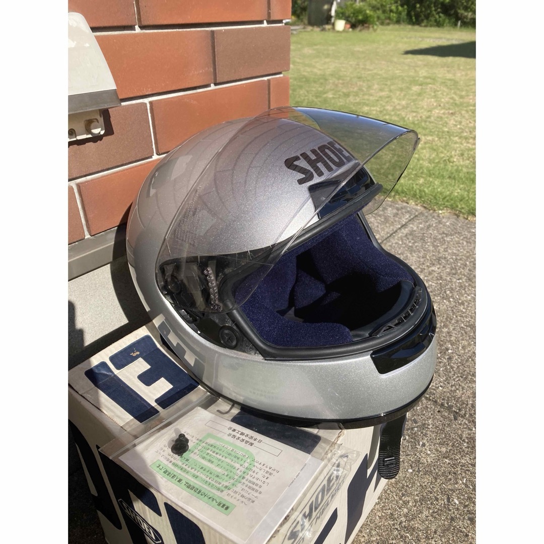 SHOEI(ショウエイ)のSHOEIショウエイ　ヘルメット　Lサイズ　シルバー　フルフェイス　フルヘル 自動車/バイクのバイク(ヘルメット/シールド)の商品写真