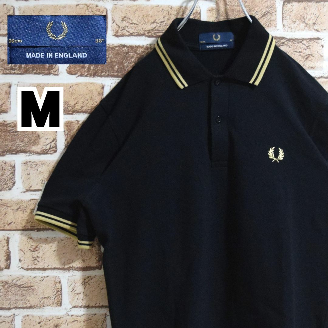 FRED PERRY(フレッドペリー)の《フレッドペリー》英国製　M12　黒×ゴールド　M相当　半袖ポロシャツ メンズのトップス(ポロシャツ)の商品写真