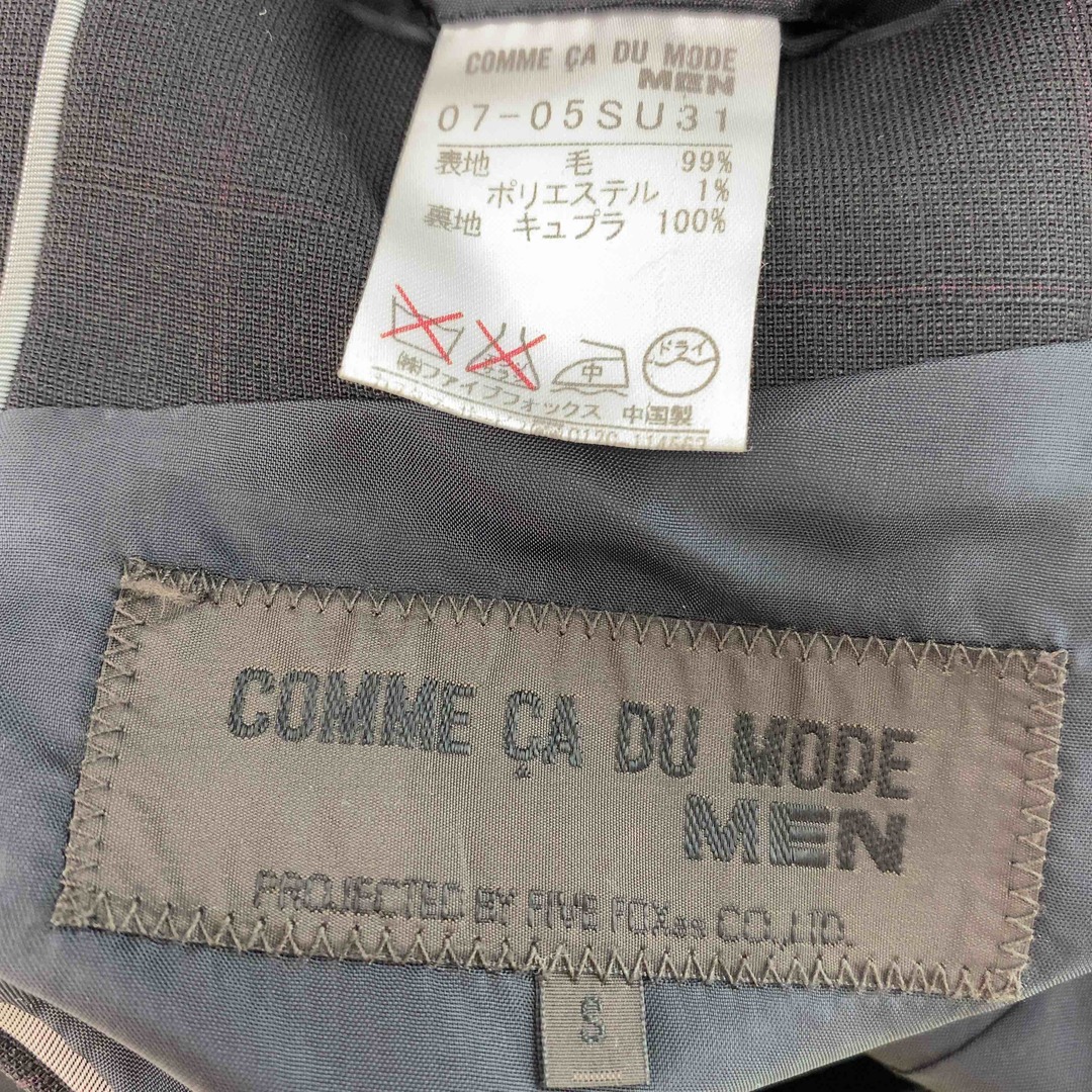 COMME CA DU MODE(コムサデモード)のCOMME CA DU MODE MEN コムサデモードメン ブラック 無地 スーツ メンズ テーラードジャケット レディースのジャケット/アウター(ノーカラージャケット)の商品写真