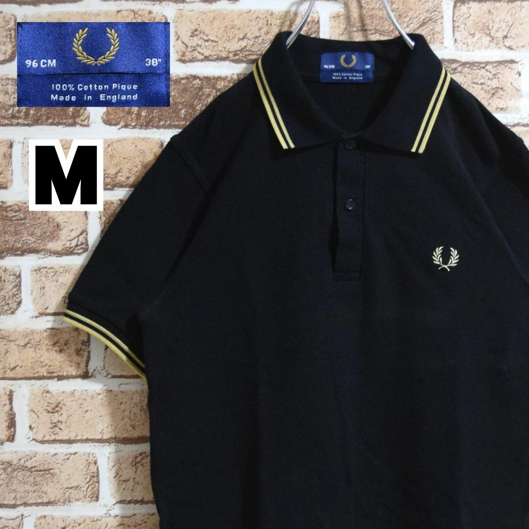 FRED PERRY(フレッドペリー)の《フレッドペリー》英国製　M12　黒×ゴールド　M相当　半袖ポロシャツ メンズのトップス(ポロシャツ)の商品写真