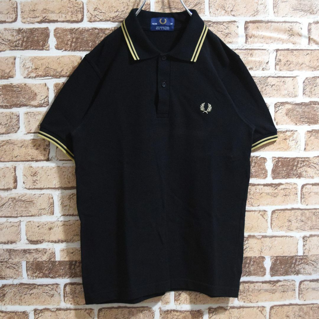 FRED PERRY(フレッドペリー)の《フレッドペリー》英国製　M12　黒×ゴールド　M相当　半袖ポロシャツ メンズのトップス(ポロシャツ)の商品写真