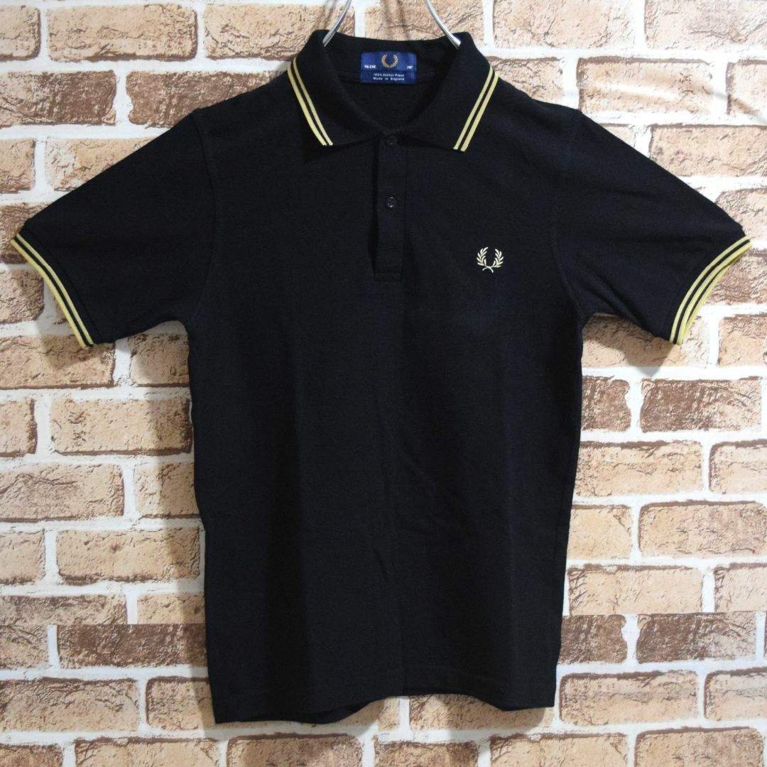 FRED PERRY(フレッドペリー)の《フレッドペリー》英国製　M12　黒×ゴールド　M相当　半袖ポロシャツ メンズのトップス(ポロシャツ)の商品写真