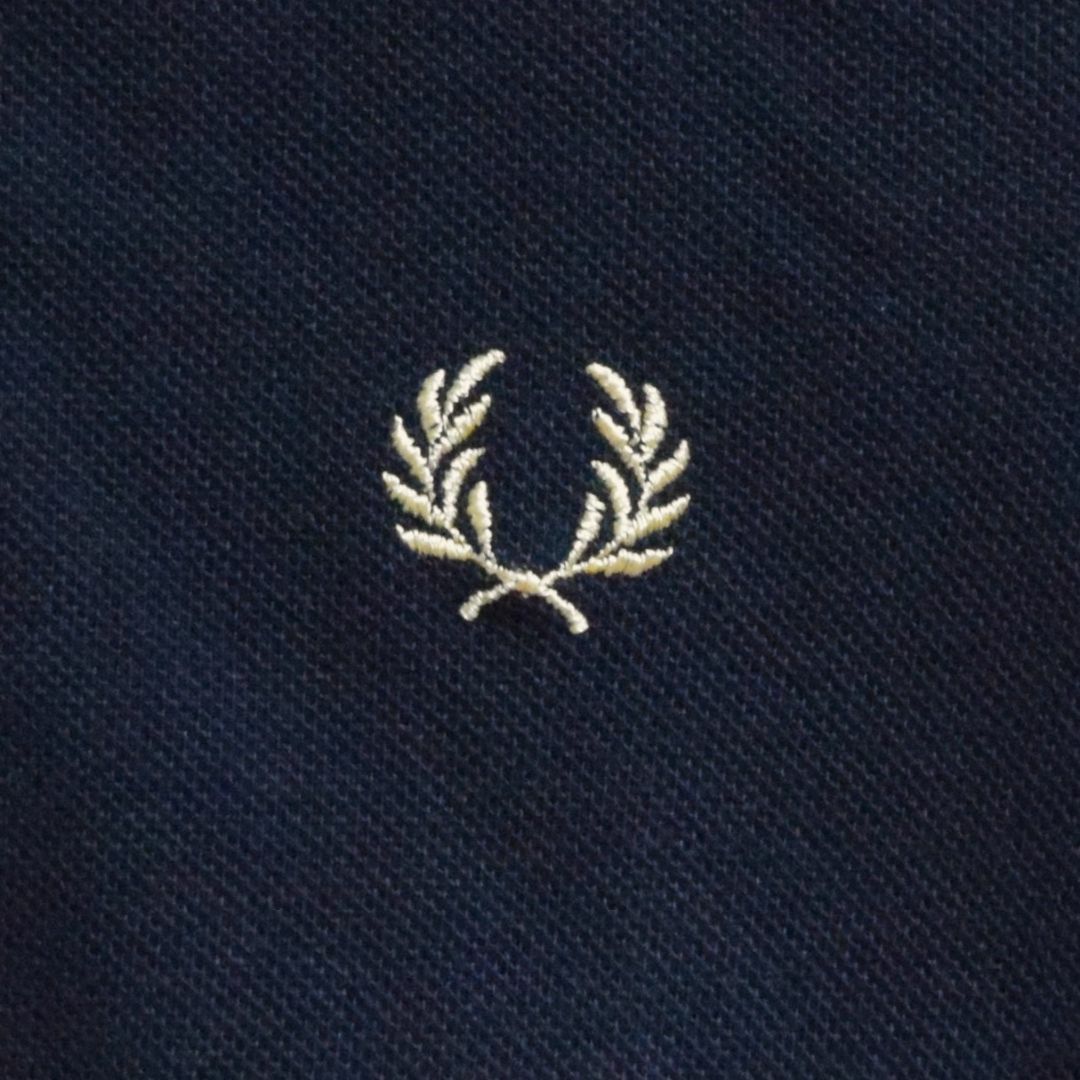 FRED PERRY(フレッドペリー)の《フレッドペリー》英国製　M12　黒×ゴールド　M相当　半袖ポロシャツ メンズのトップス(ポロシャツ)の商品写真