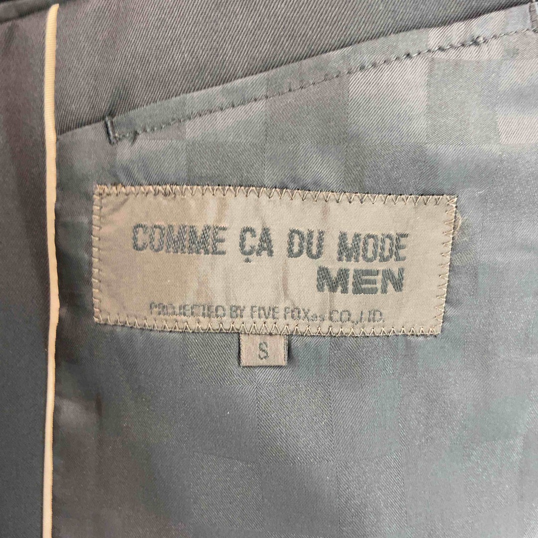 COMME CA DU MODE(コムサデモード)のCOMME CA DU MODE（mens） コムサデモード メンズ ブラック系 無地 スーツ ノーカラージャケット メンズのジャケット/アウター(テーラードジャケット)の商品写真