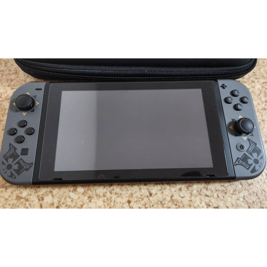 Nintendo Switch(ニンテンドースイッチ)の【美品】ニンテンドースイッチ　2021 モンスターハンター モンハンエディション エンタメ/ホビーのゲームソフト/ゲーム機本体(家庭用ゲーム機本体)の商品写真