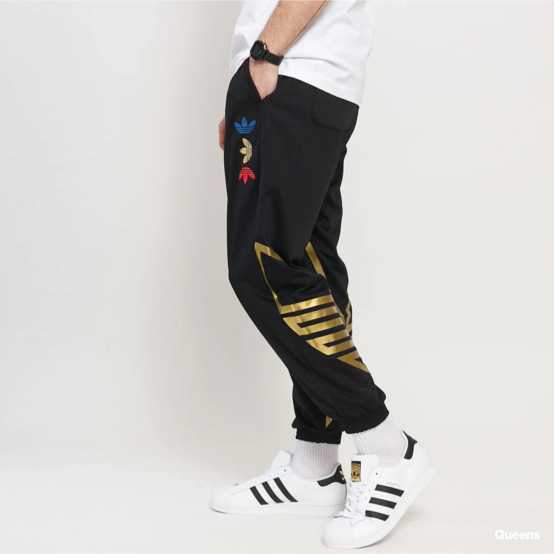 adidas(アディダス)のアディダスオリジナルス adidas メタリック トラック パンツ ジャージ メンズのパンツ(その他)の商品写真