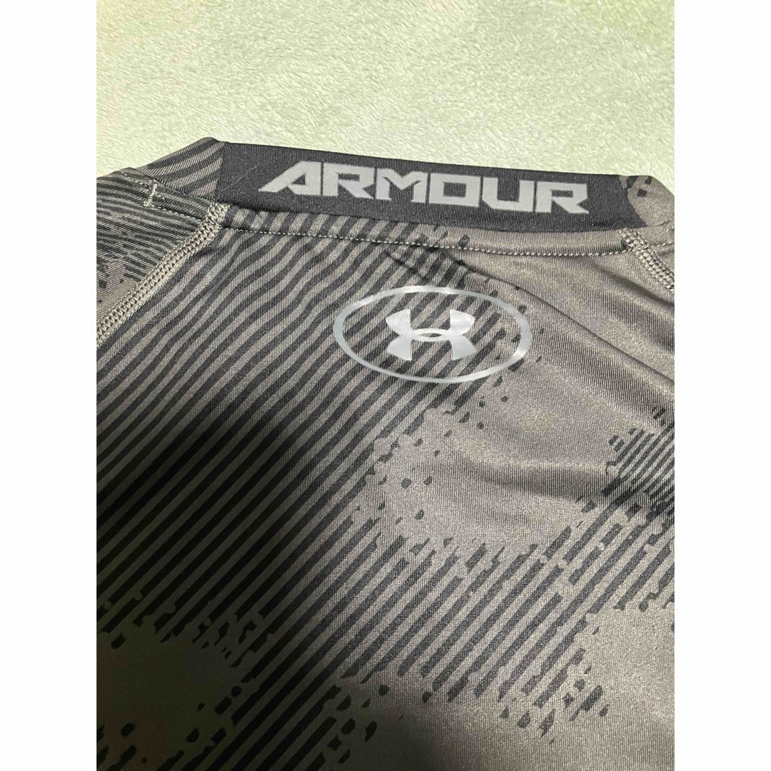 UNDER ARMOUR(アンダーアーマー)のアンダーアーマー  ヒートギア　コンプレショッンシャツ　黒⑩ メンズのトップス(Tシャツ/カットソー(半袖/袖なし))の商品写真