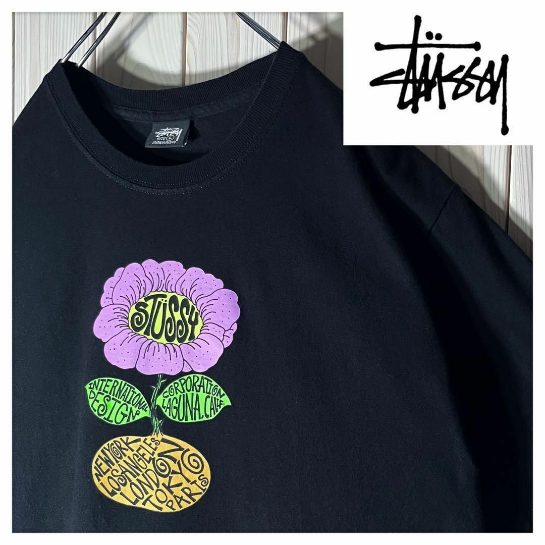 STUSSY(ステューシー)の【美品 L】ステューシー ハンドサイン フラワー プリント Tシャツ 黒 メンズのトップス(Tシャツ/カットソー(半袖/袖なし))の商品写真