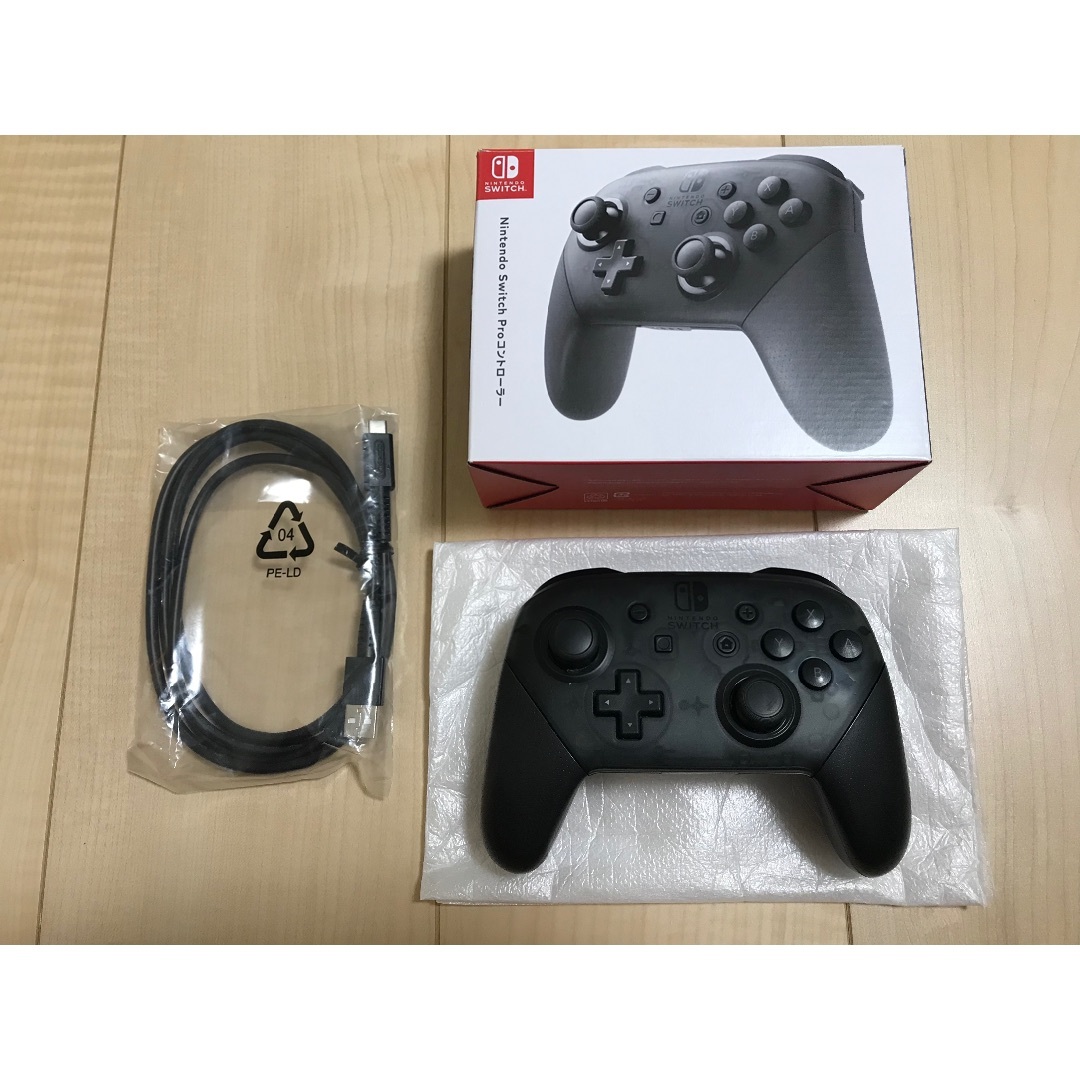 Nintendo Switch(ニンテンドースイッチ)の✨ニンテンドースイッチ用純正プロコン✨動作確認済み エンタメ/ホビーのゲームソフト/ゲーム機本体(その他)の商品写真