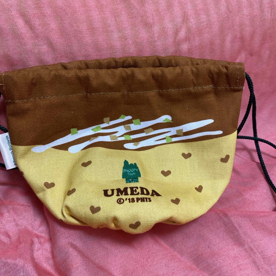 SNOOPY(スヌーピー)のスヌーピー　たこ焼き型ミニ巾着袋 エンタメ/ホビーのおもちゃ/ぬいぐるみ(キャラクターグッズ)の商品写真