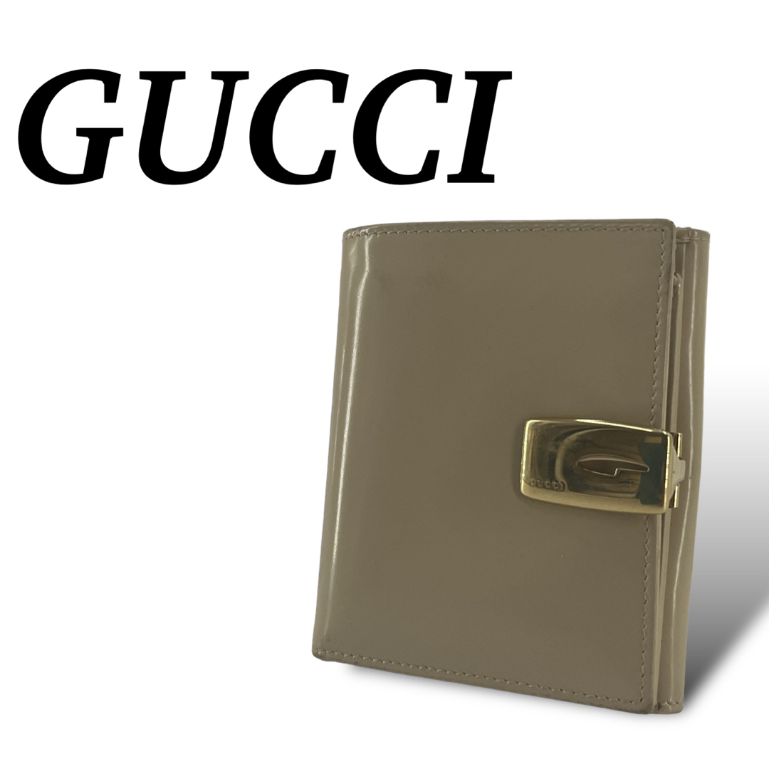 Gucci(グッチ)のグッチ　コンパクト財布 二つ折り　ホワイトG金具 ゴールド　ウォレット　エナメル レディースのファッション小物(財布)の商品写真