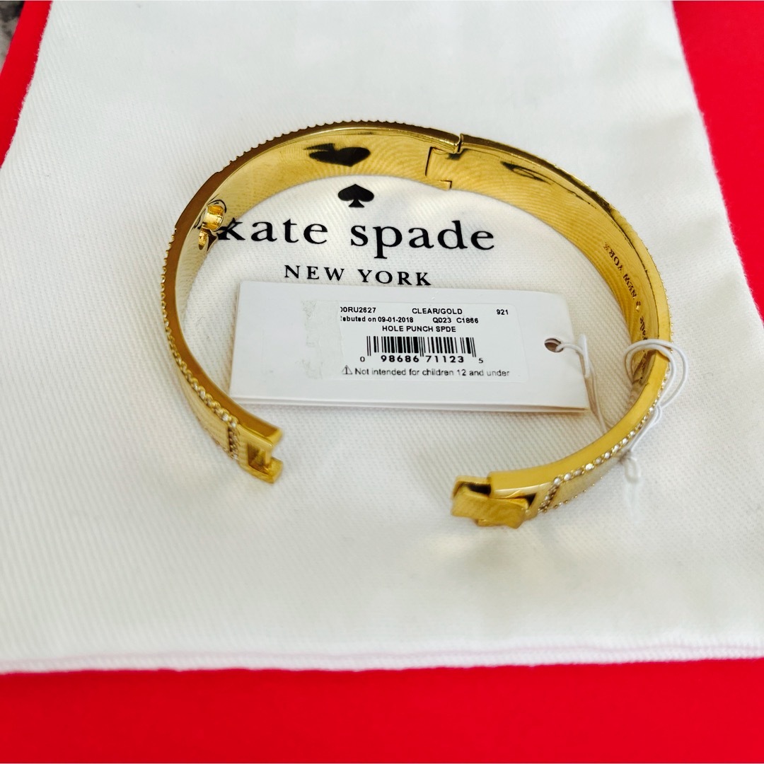 kate spade new york(ケイトスペードニューヨーク)の【新品未使用】訳アリ　ケイトスペード　バングル　ゴールド レディースのアクセサリー(ブレスレット/バングル)の商品写真