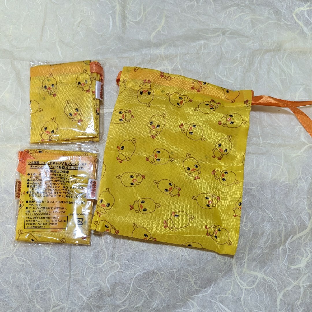 日清食品(ニッシンショクヒン)のチキンラーメン　ヒヨコちゃん巾着 エンタメ/ホビーのコレクション(ノベルティグッズ)の商品写真
