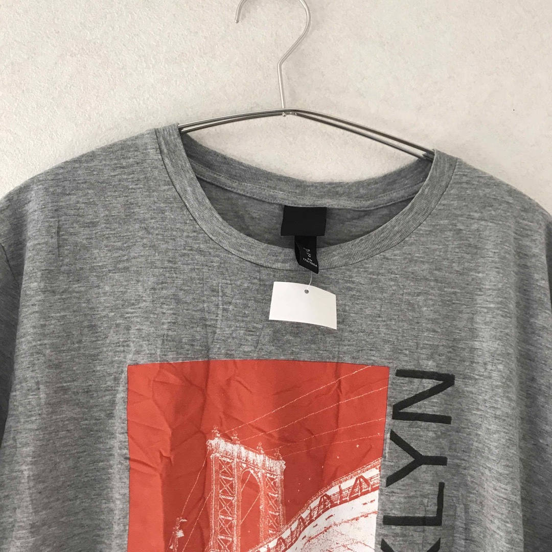 H&M(エイチアンドエム)の未使用タグ付き　H&M エイチアンドエム　Mサイズ メンズのトップス(Tシャツ/カットソー(半袖/袖なし))の商品写真