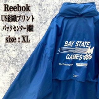 リーボック(Reebok)のIJ105【入手困難】UKユーロ古着ブランド刺繍US組織コラボナイロンジャケット(ナイロンジャケット)