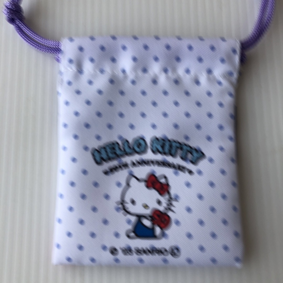 サンリオ(サンリオ)のハローキティ   50周年　キキララ  ポーチ　小さな袋 レディースのファッション小物(ポーチ)の商品写真