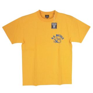 ザリアルマッコイズ(THE REAL McCOY'S)のThe REAL McCOY'S ザリアルマッコイズ Ｔシャツ MC6021 US METALS プリント Tシャツ オレンジ系 L 42【新古品】【未使用】【中古】(シャツ)