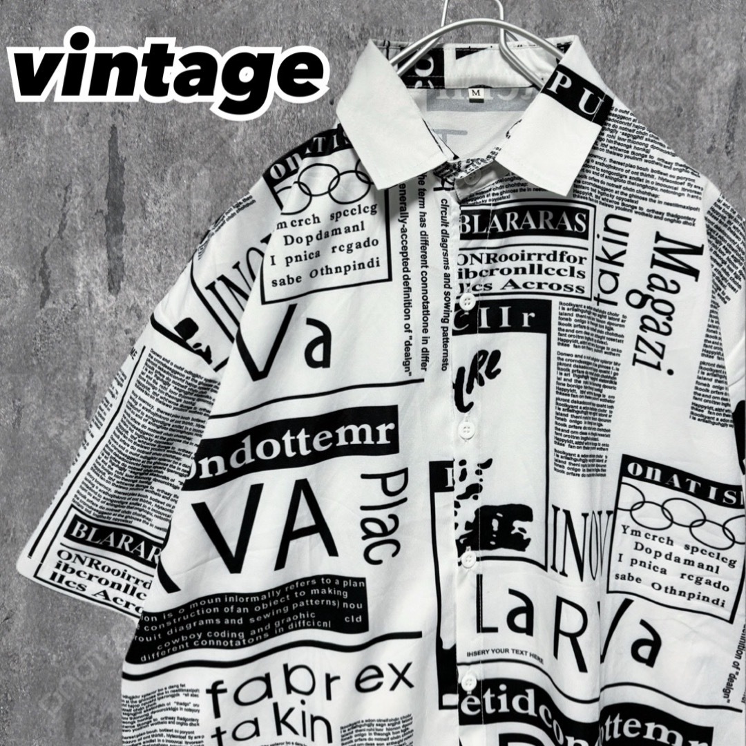 VINTAGE(ヴィンテージ)の【美品】半袖シャツ 柄シャツ 英字 ロゴ 総柄 ストリート オーバーサイズ メンズのトップス(シャツ)の商品写真