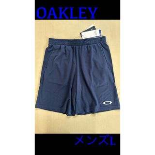 オークリー(Oakley)の新品タグ付き　オークリー OAKLEY メンズL クロスハーフパンツ　ネイビー(ショートパンツ)