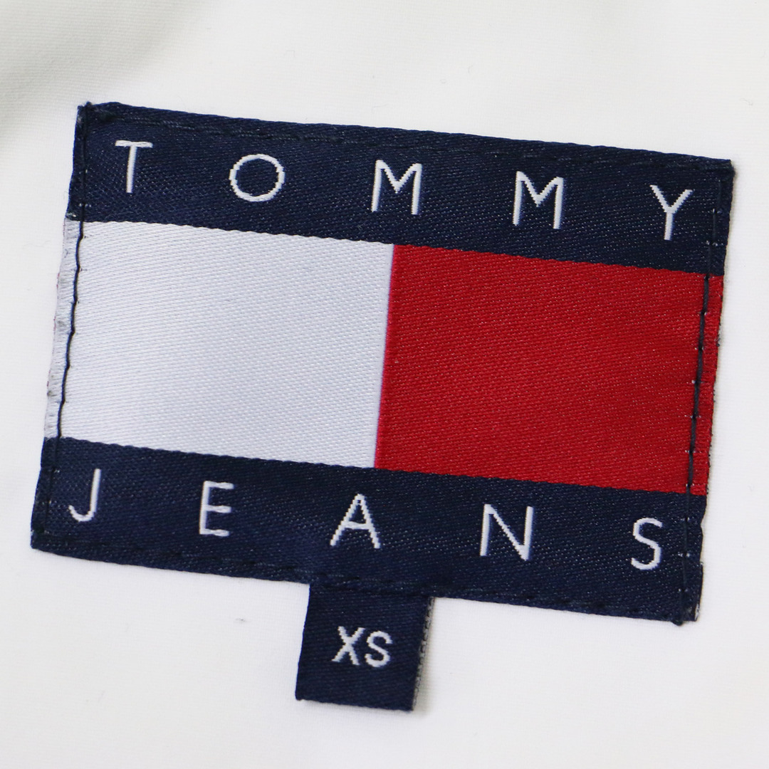 TOMMY JEANS トミー ジーンズ ジャケット ナイロン ジャケット ホワイト 白 XS アノラック セーリングジャケット フード ワッペン ロゴ 刺繍 ネオンカラー アウター シンプル カジュアル メンズライク 【レディース】【中古】【K4094】 レディースのジャケット/アウター(ナイロンジャケット)の商品写真