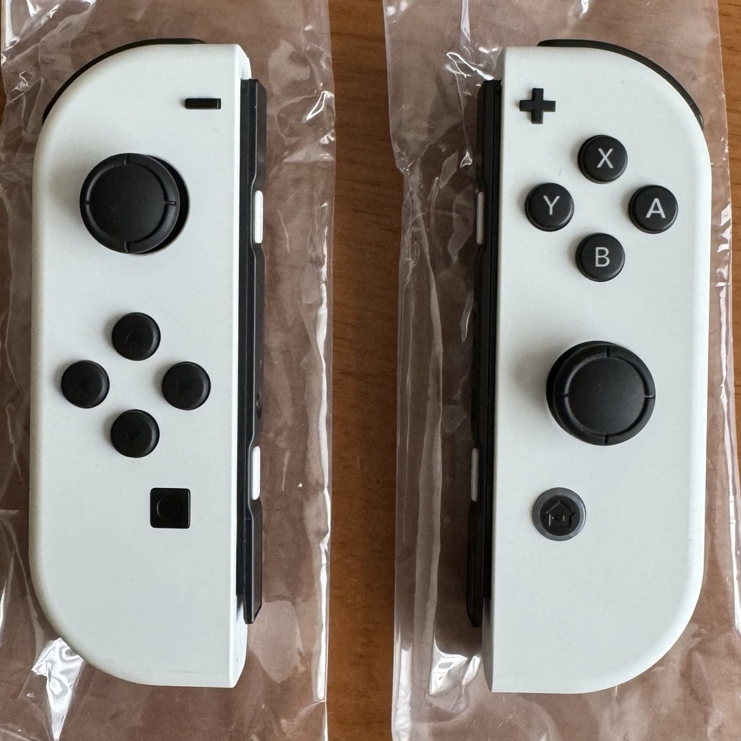 Nintendo Switch(ニンテンドースイッチ)の【中古品】Nintendo Switch 有機ELモデル ホワイト 動作確認済み エンタメ/ホビーのゲームソフト/ゲーム機本体(家庭用ゲーム機本体)の商品写真