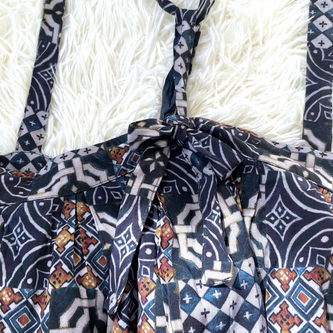 IKI(イキ)のイキ パッチワークプリント 総柄 タック サロペット スカート ロング フレア レディースのスカート(ロングスカート)の商品写真