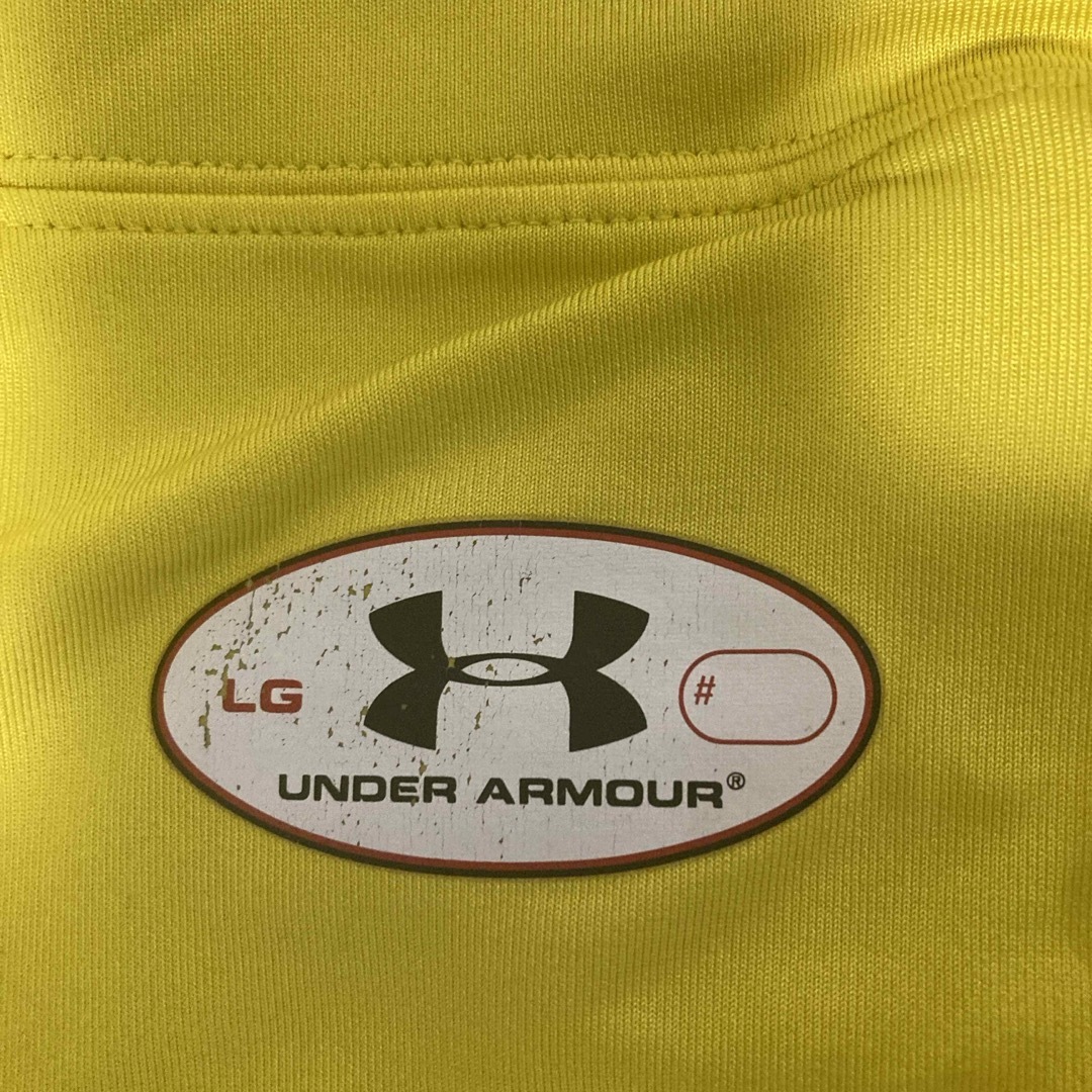 UNDER ARMOUR(アンダーアーマー)のアンダーアーマン　インナー　黄色 メンズのトップス(Tシャツ/カットソー(半袖/袖なし))の商品写真