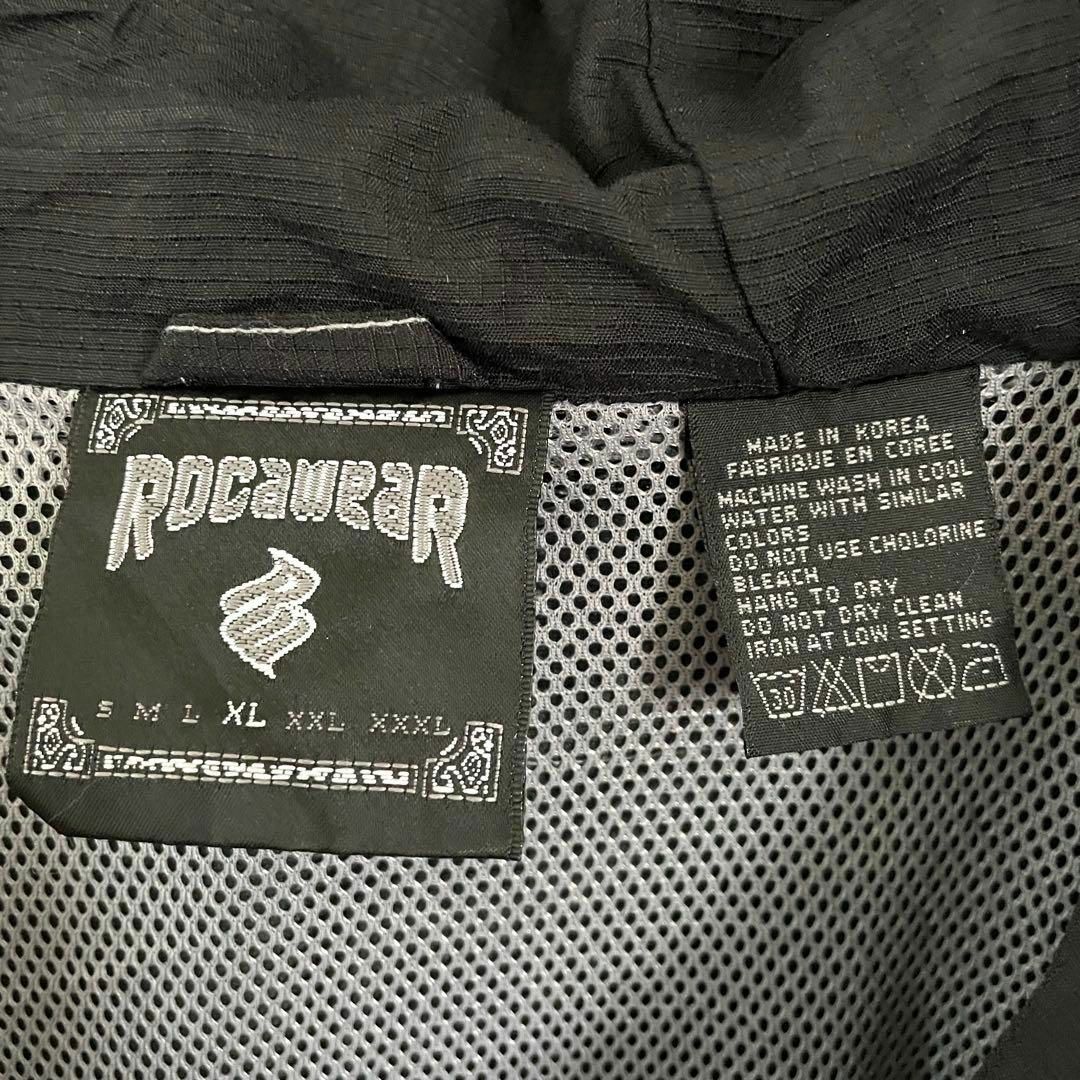 Rocawear(ロカウェア)のロカウェア ナイロジャケット アノラックパーカー 両面刺繍 メッシュ 黒 XL メンズのジャケット/アウター(ナイロンジャケット)の商品写真