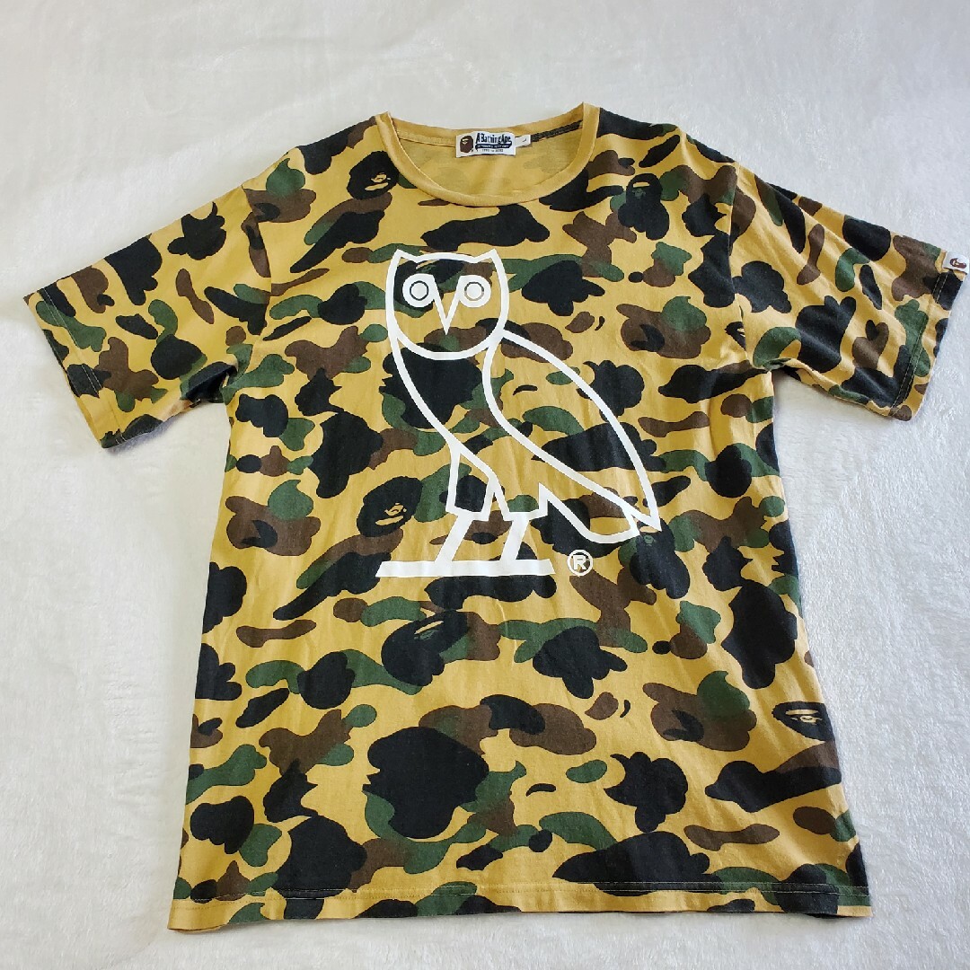 A BATHING APE(アベイシングエイプ)の【希少】A BATHING APE × OVO コラボ　Tシャツ　カモフラ メンズのトップス(Tシャツ/カットソー(半袖/袖なし))の商品写真