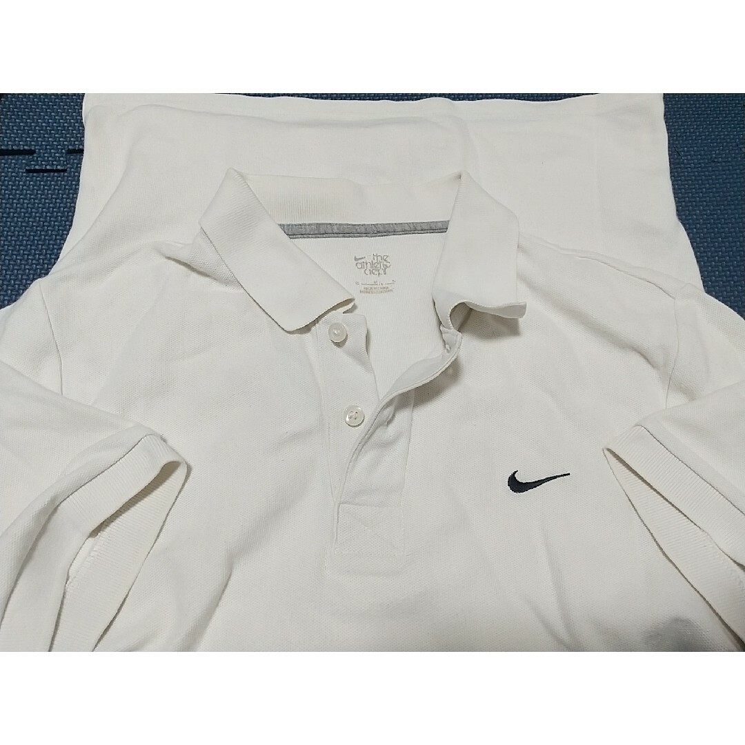 NIKE(ナイキ)のNIKE ポロシャツ Ｍサイズ 白 ナイキ スポーツ アメカジ ホワイト 古着屋 メンズのトップス(ポロシャツ)の商品写真
