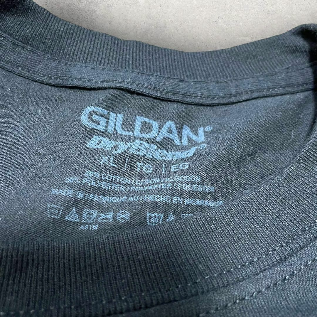 US古着 GILDAN Caroling Keno 企業ロゴ Tシャツ XL 黒 メンズのトップス(Tシャツ/カットソー(半袖/袖なし))の商品写真