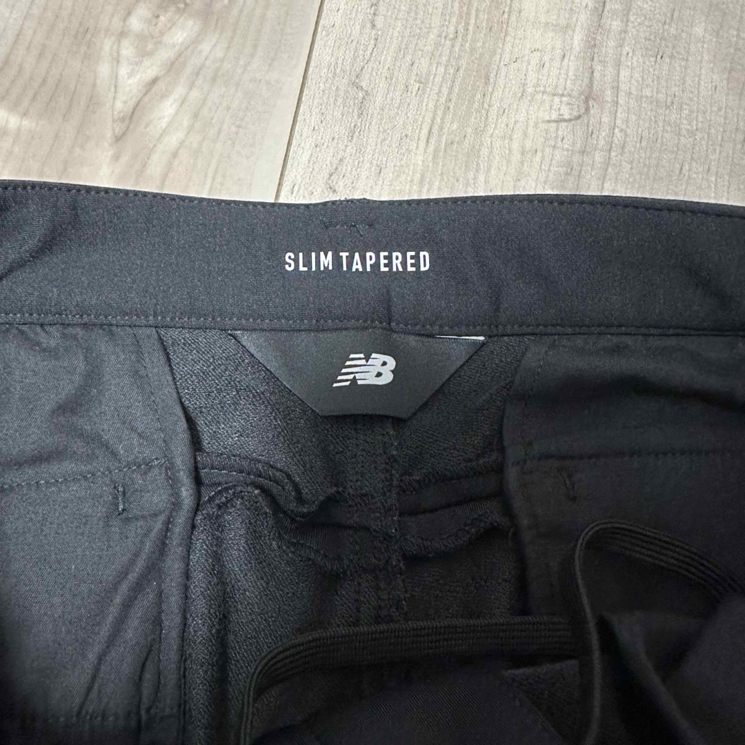 New Balance(ニューバランス)のニューバランス MET24 Slim Tapered Fit メンズのパンツ(その他)の商品写真