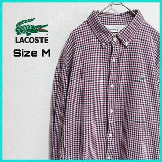 ラコステ(LACOSTE)のラコステ BDシャツ 古着 M ワンポイントロゴ チェック 赤 黒a68(シャツ)