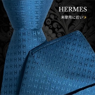 エルメス(Hermes)のHERMES ネクタイ ブルー系 微光沢 ファソネ H柄 フランス製(ネクタイ)